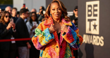 Queen Latifah Bundles Up in a Bold, Oversized Coat on the 2026 BET Awards Red Carpet